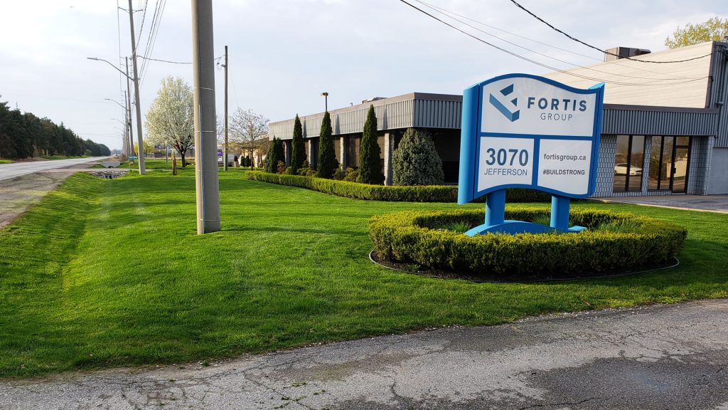 A recently mowed and treated commercial lawn